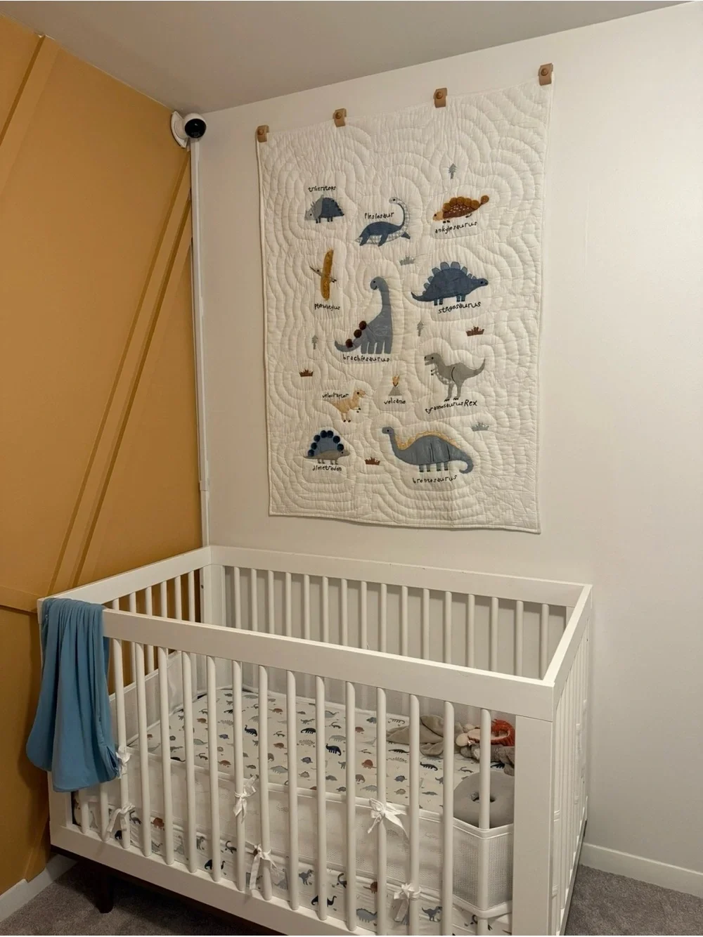 Embroidered Dino Baby Quilt & fitted crib sheet Cream - with Blue & Tan Dinos